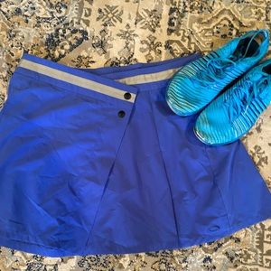 Oakley tennis skirt blue size 10 pink size 8. Wrap around style skirt